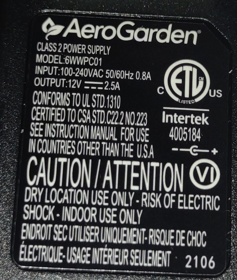 View of the technical specifications inscribed on the AeroGarden Harvest power supply
