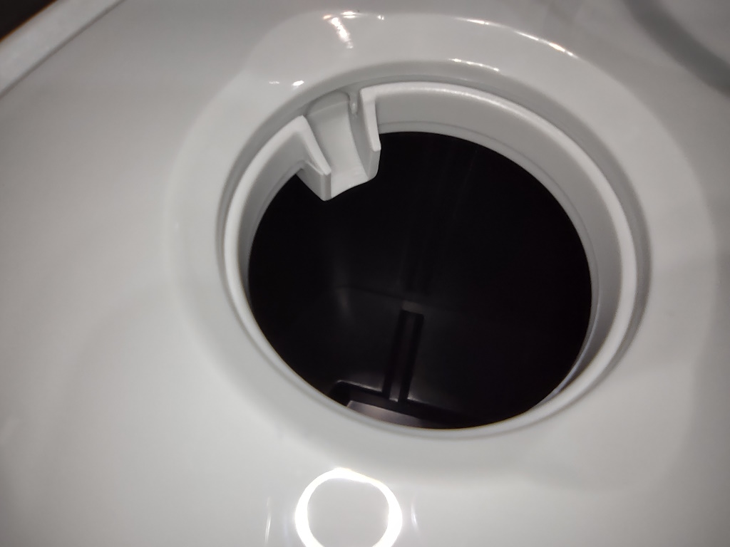 Close-up of one pod seat on AeroGarden Harvest growing tray