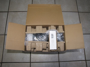 View of opened package containing an AeroGarden Harvest