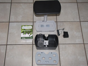 AeroGarden Harvest disassembled with parts laid out