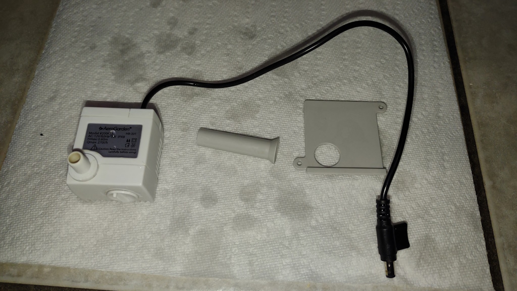 AeroGarden Harvest water pump, the vertical tube, and the cover