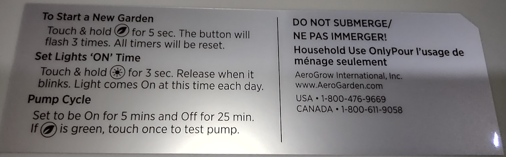 Close-up of the sticker on the AeroGarden Harvest base where the tub rests